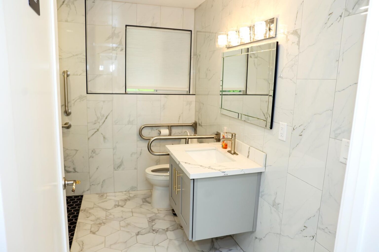 Updated bathroom with safety grab bars